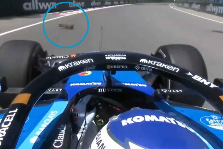 F1 bolid iz cockpit perspektive na stazi.