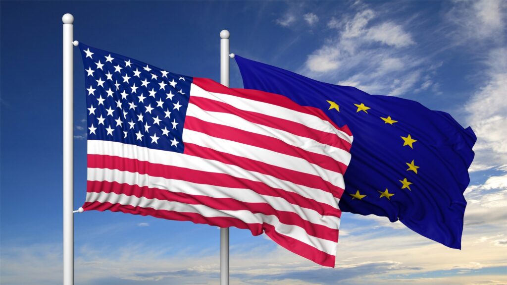 Ameri?ke i evropske zastave kao ilustracija politi?ke odluke SAD-a