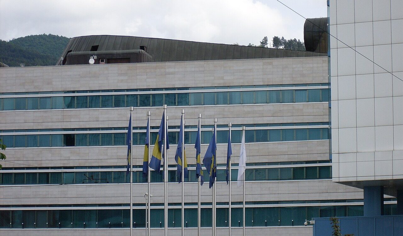 Flags of Bosnia and Herzegovina in front of parliament