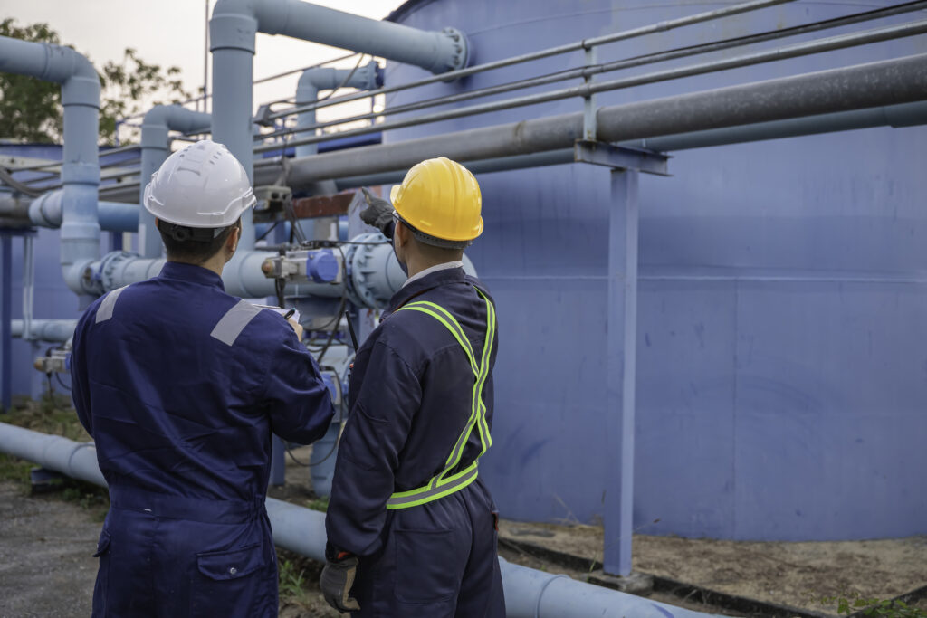 Petrochemical Engineer Working Petroleum Oil Refinery Industry Area Industrial Technician Worker Maintenance Inspect Manufacturing Energy Power Gas System Factory