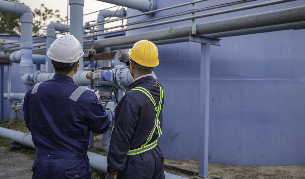 Petrochemical Engineer Working Petroleum Oil Refinery Industry Area Industrial Technician Worker Maintenance Inspect Manufacturing Energy Power Gas System Factory