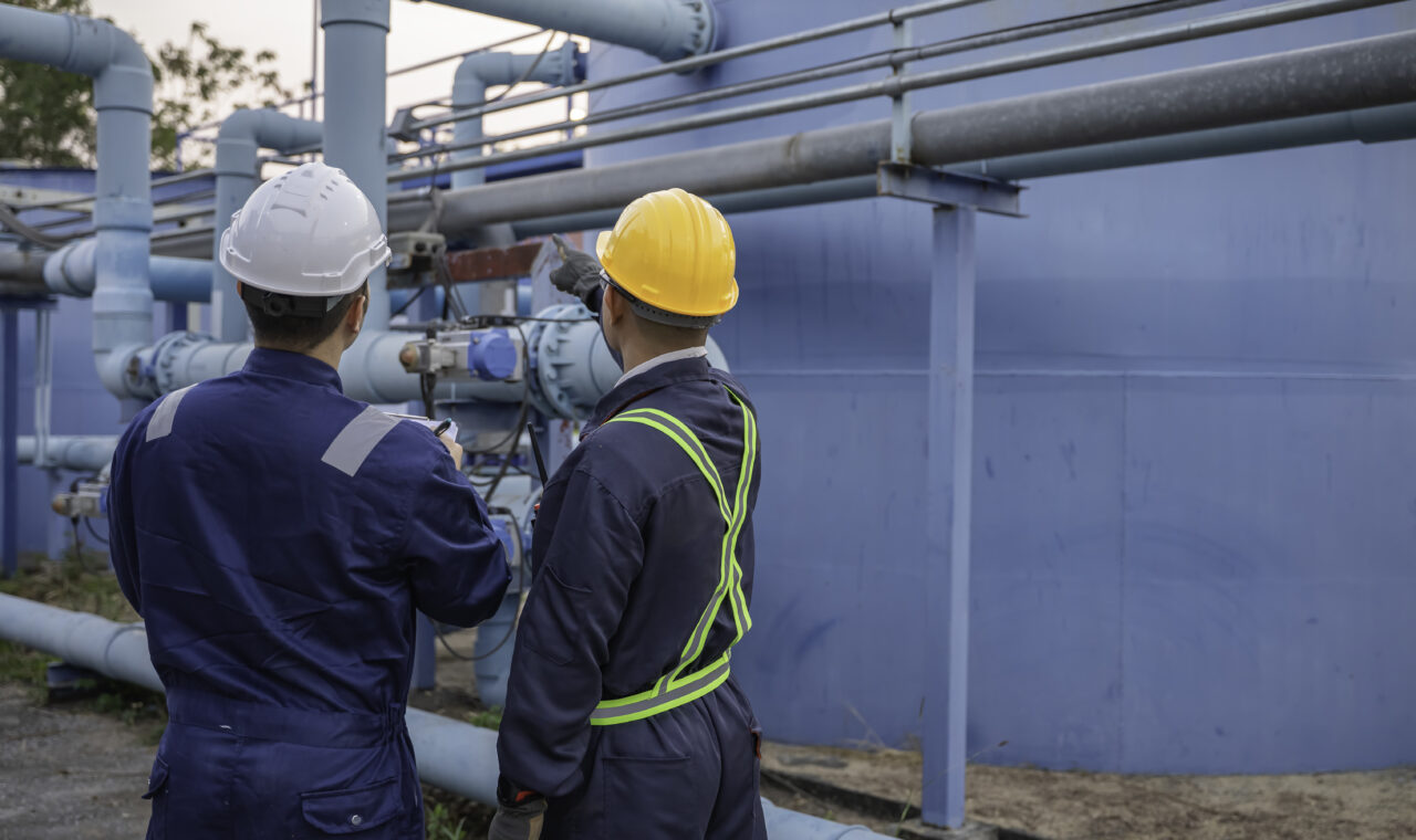 Petrochemical Engineer Working Petroleum Oil Refinery Industry Area Industrial Technician Worker Maintenance Inspect Manufacturing Energy Power Gas System Factory